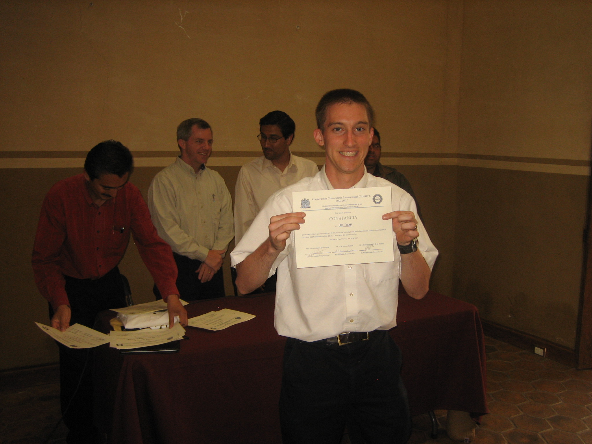Jeff receives a certificate for his participation
		 with UAZ.