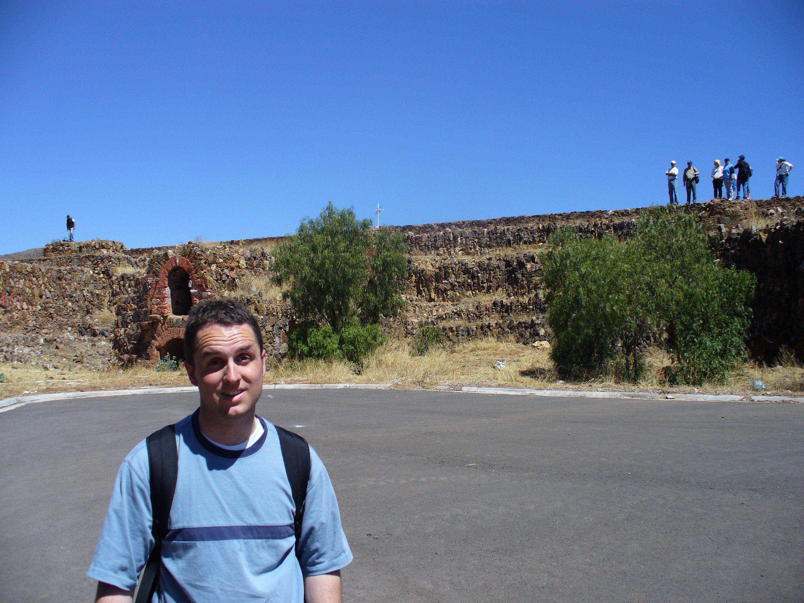 Nathan stands in front of a detention visit during
		 a site visit.